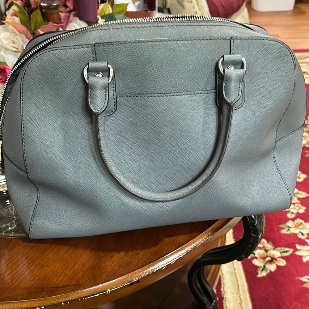 I’m am unaware if this is authentic or not. But it still is a beautiful bag.